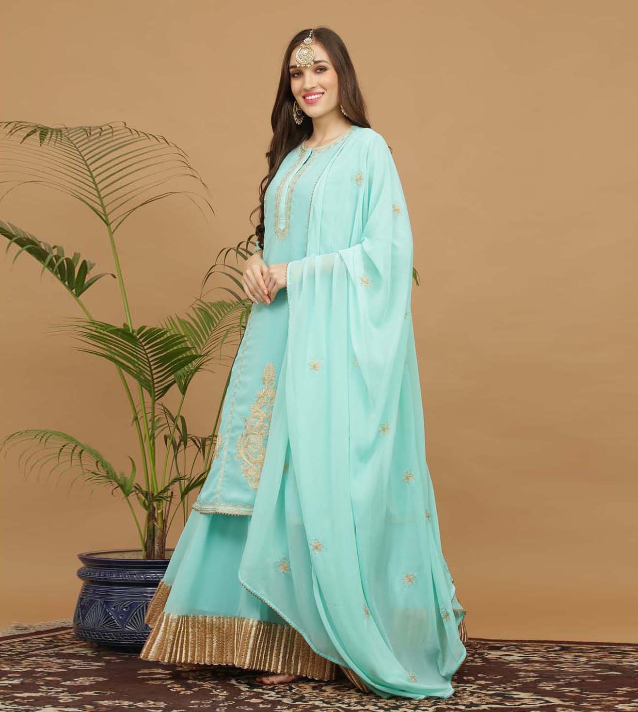 Kaanchie Nanggia Turquoise Embroidery Georgette Kurta with Skirt & Dupatta(Set of 3)