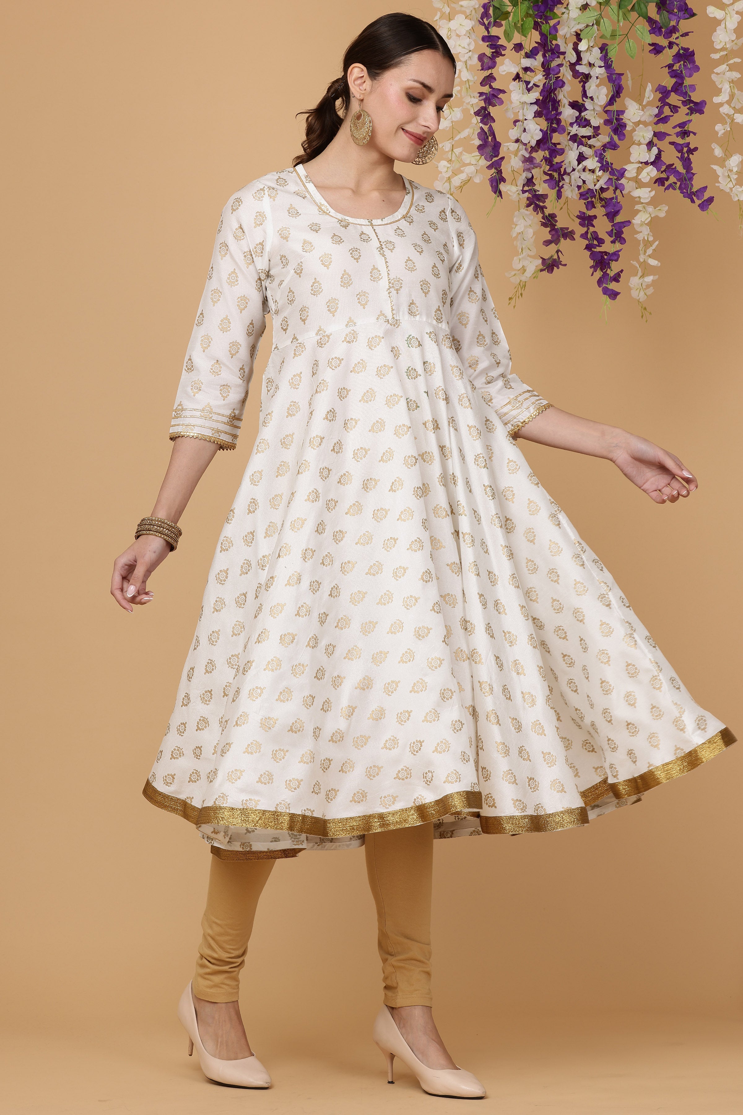 Kaanchie Nanggia White printed flayred kurta with chudidar