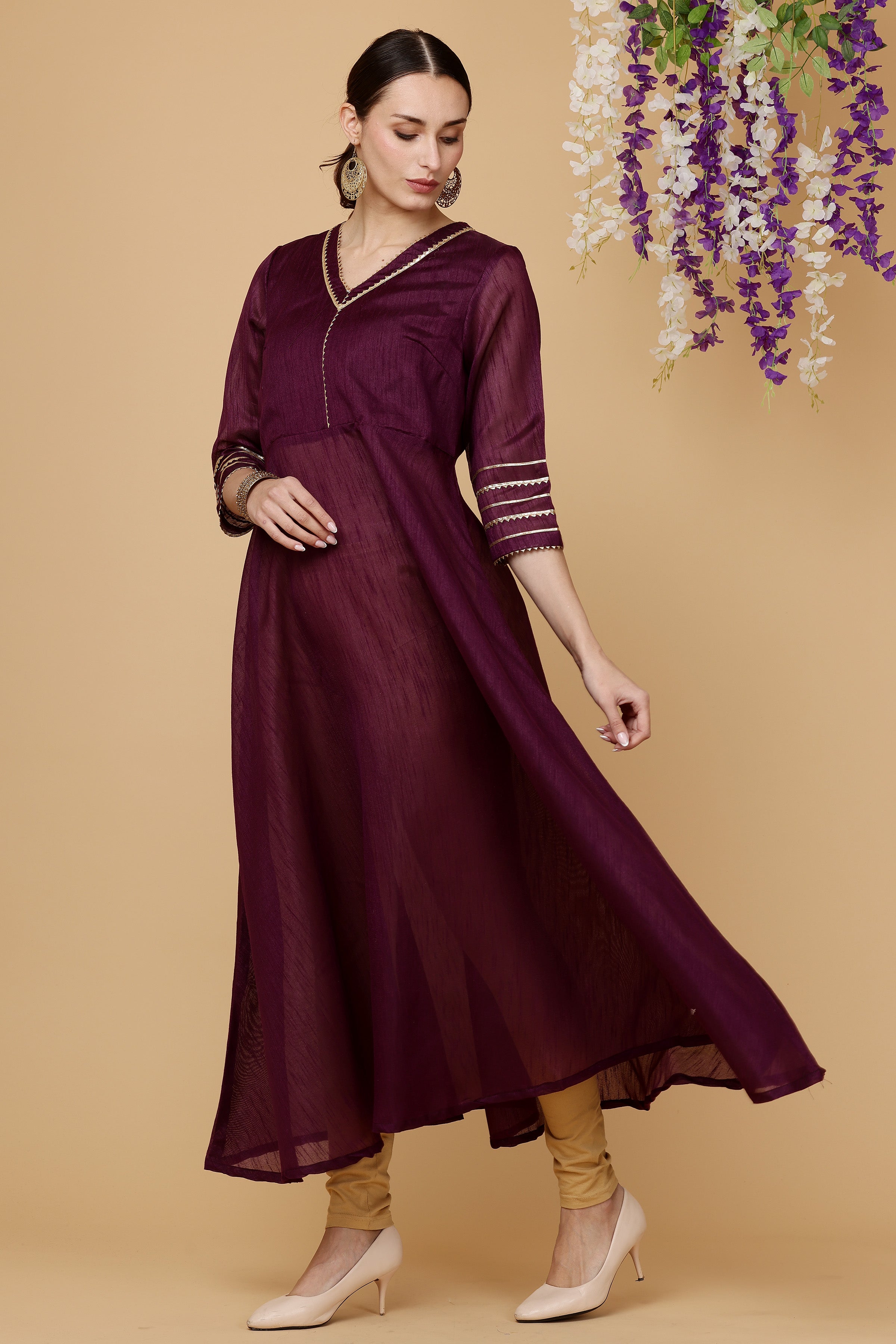 Kaanchie Nanggia Magenta solid flayred kurta with chudidar