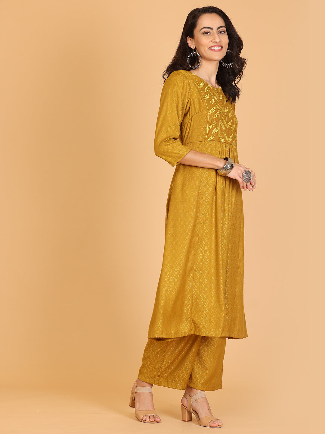 Kaanchie Nanggia Mustard Embroidered Flayred Kurta with Pant (Set of 2)