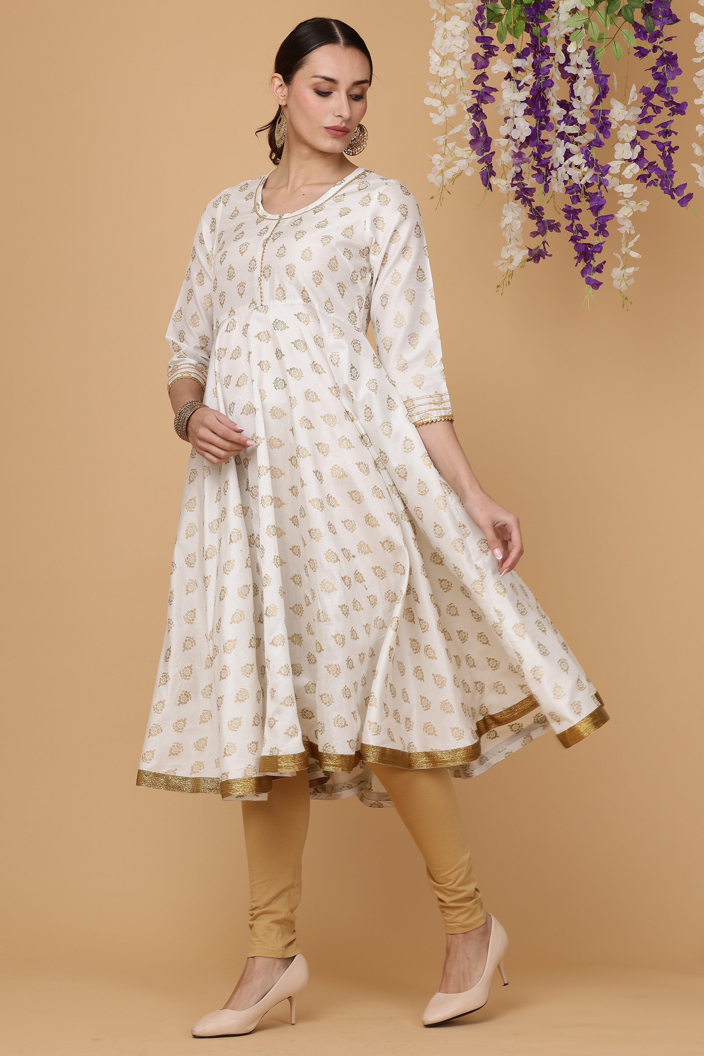 Kaanchie Nanggia White printed flayred kurta with chudidar