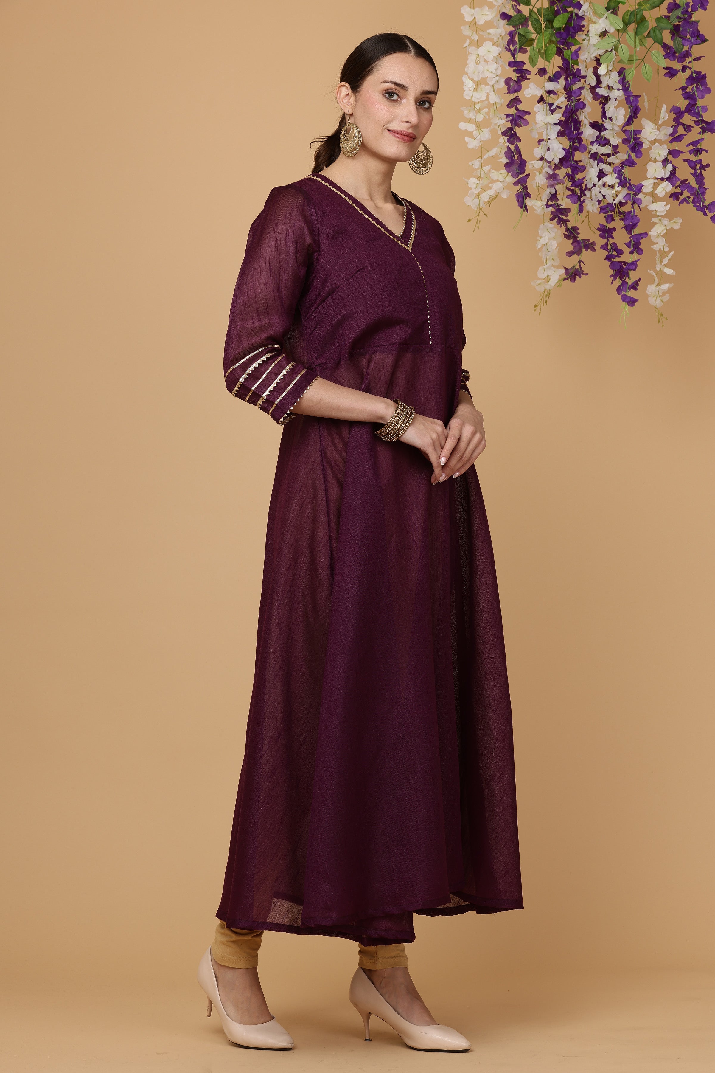 Kaanchie Nanggia Magenta solid flayred kurta with chudidar