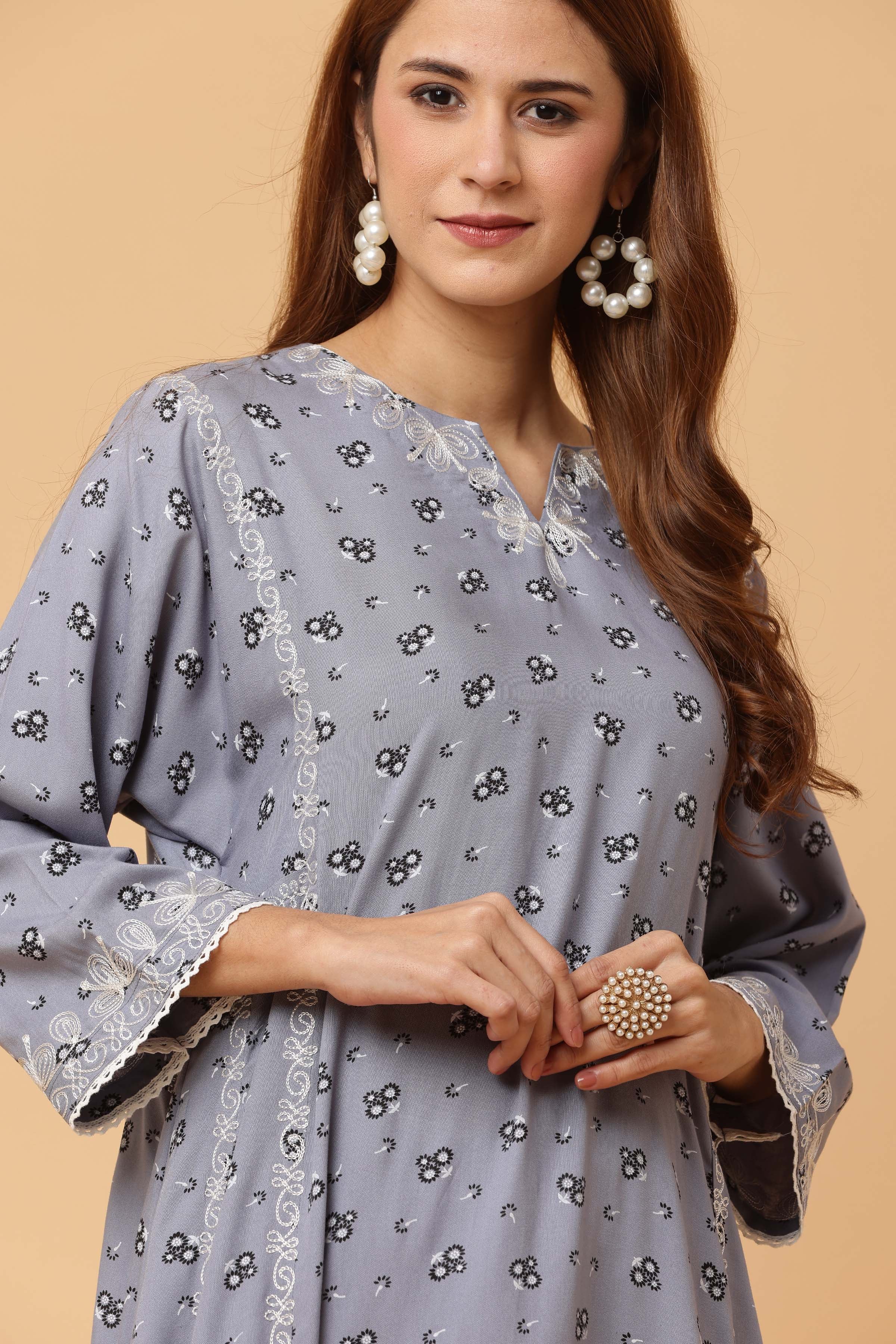 Kaanchie Nanggia Grey Embroidered Flared Kurta with Leggings (Set of 2)