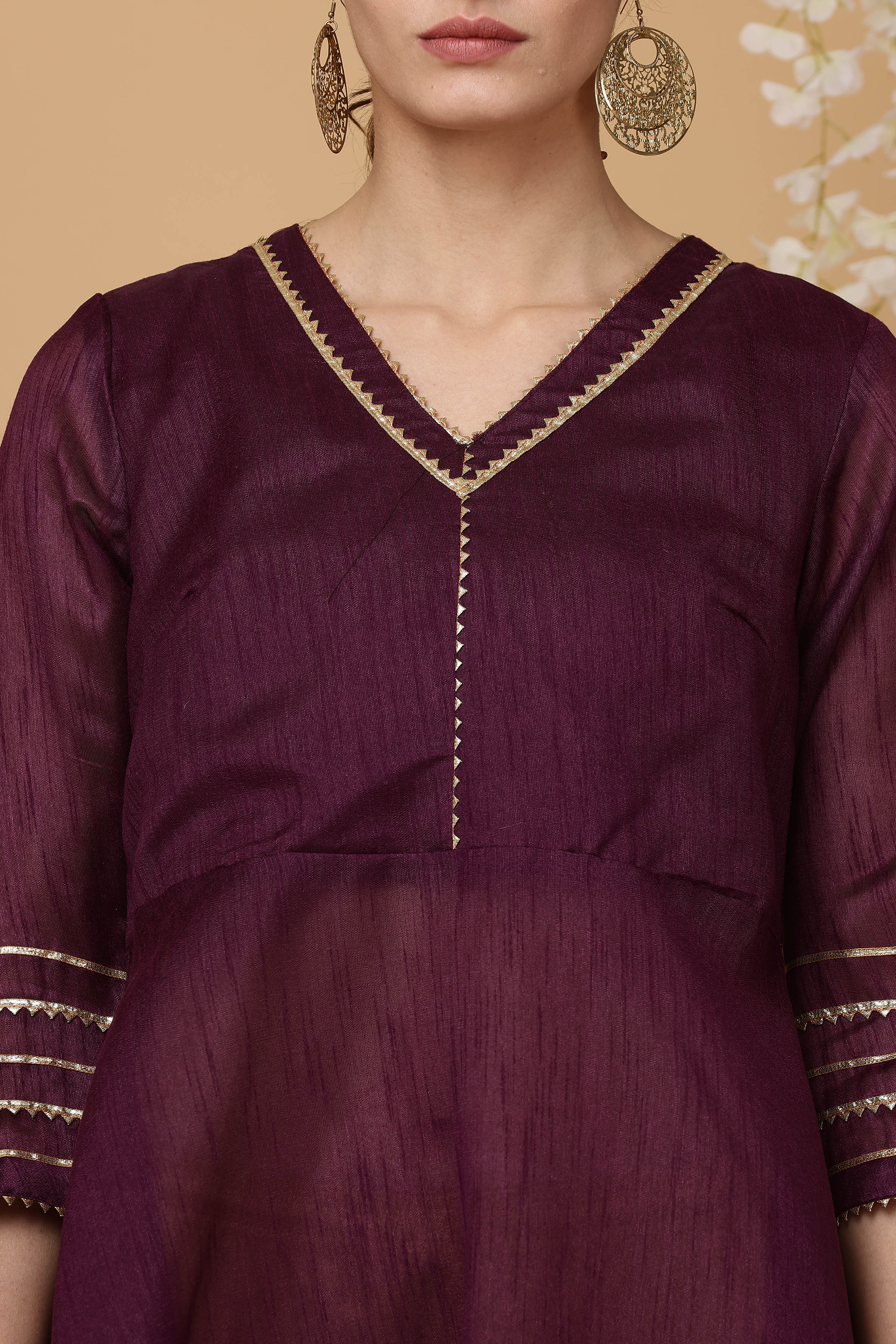 Kaanchie Nanggia Magenta solid flayred kurta with chudidar