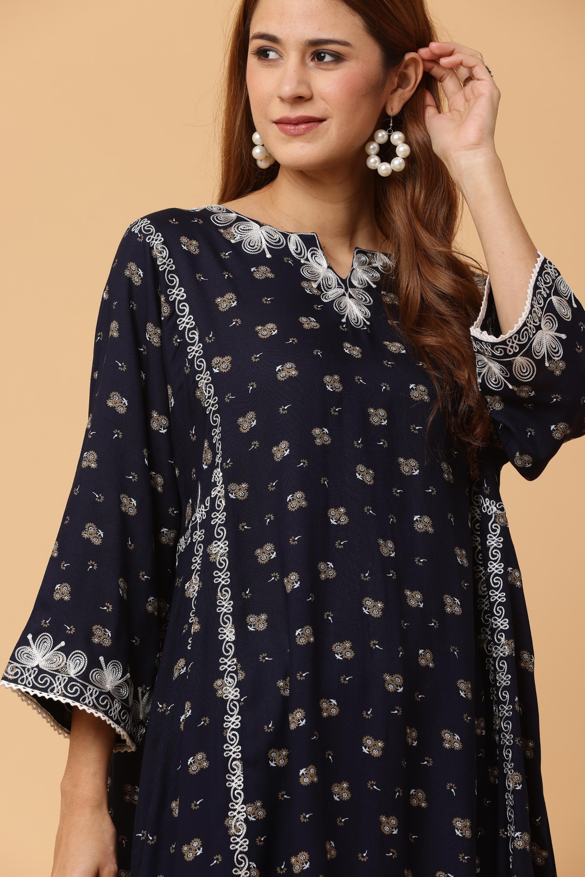Kaanchie Nanggia Navy Blue Embroidered Flared Kurta with Leggings (Set of 2)