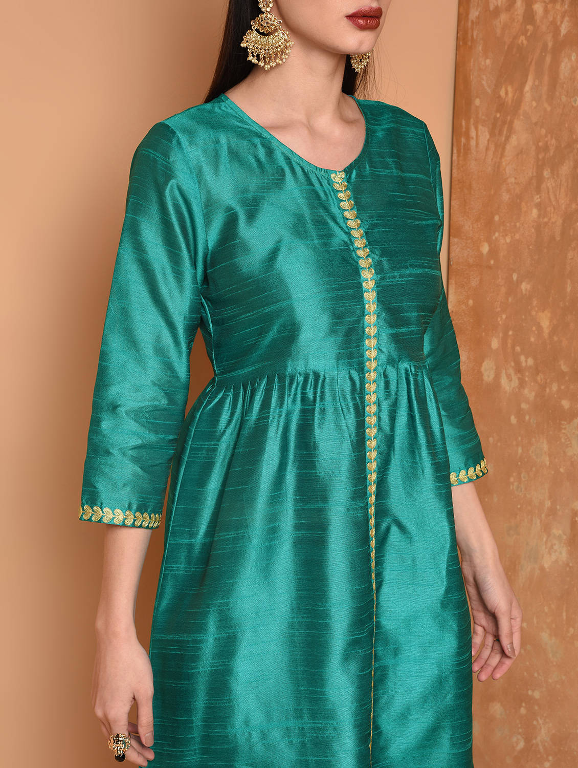 Kaanchie Nanggia Teal Solid Straight Kurta With Pant (Set of 2)